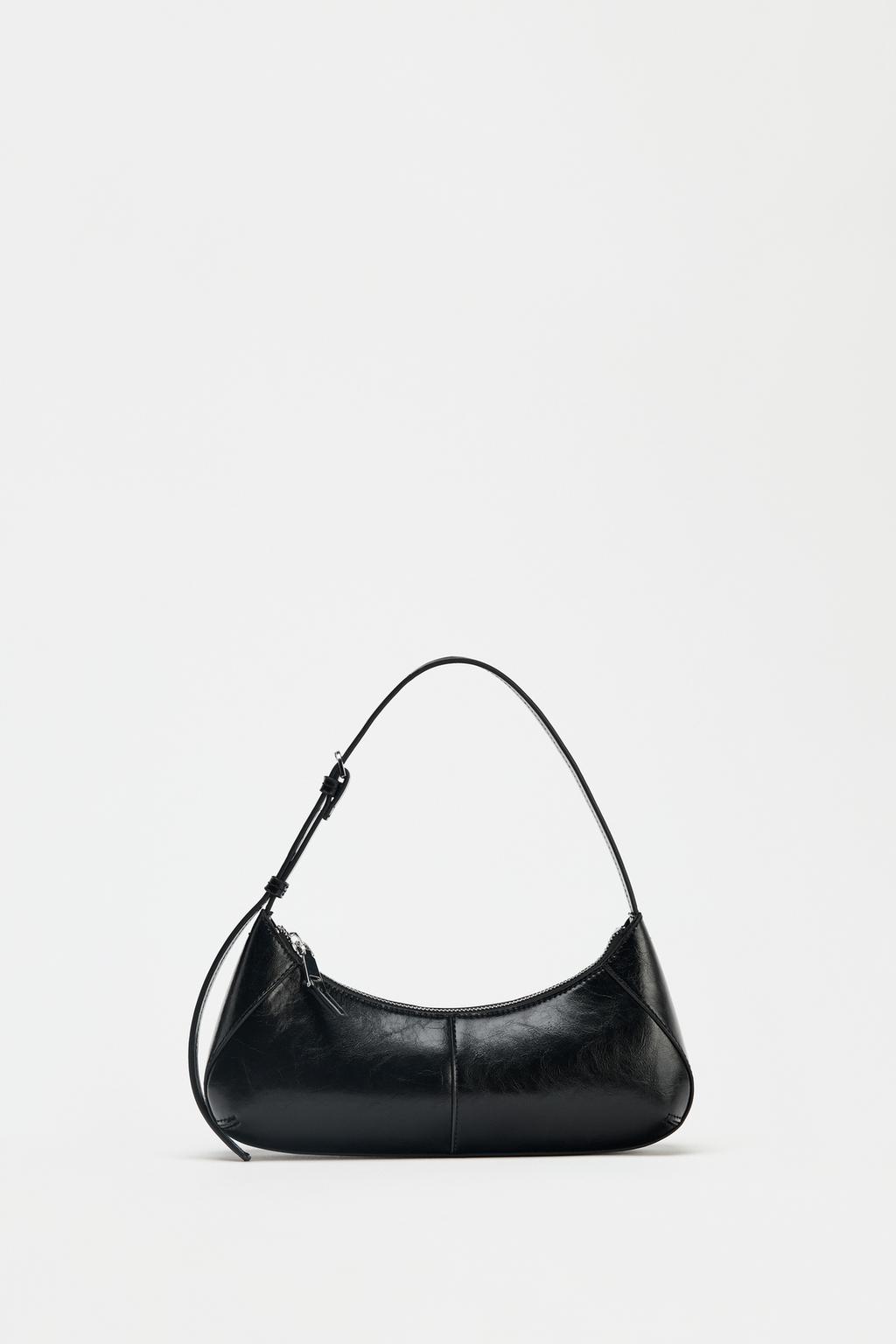 HALBMONDFÖRMIGE SCHULTERTASCHE