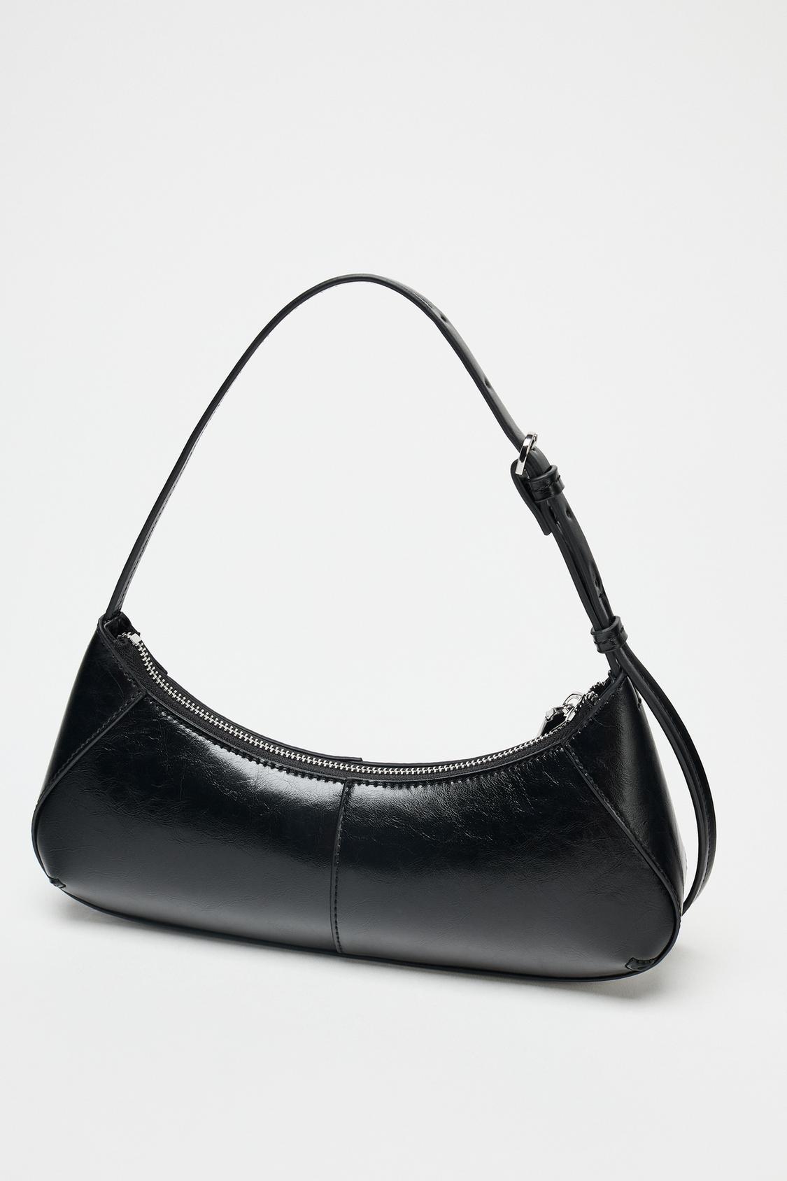 HALBMONDFÖRMIGE SCHULTERTASCHE